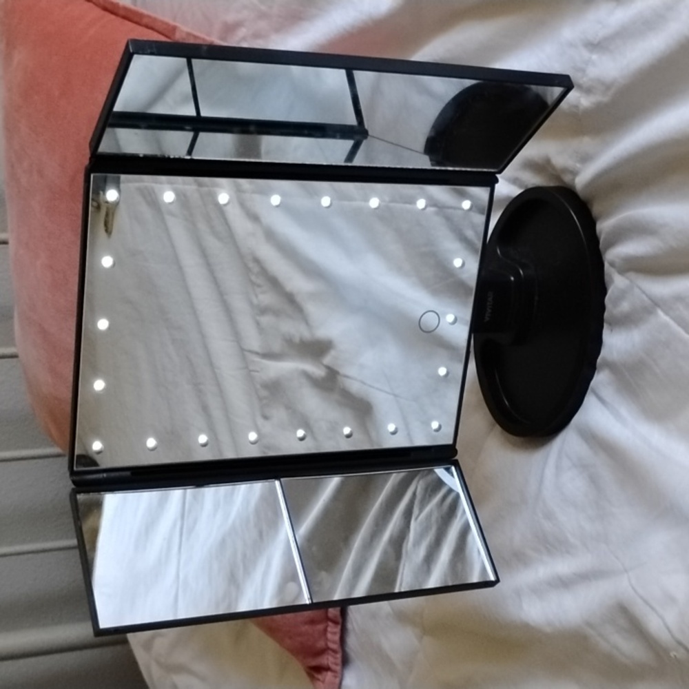 Mirror magnifying adjustable light up